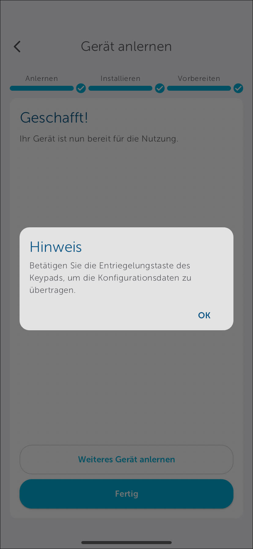 Bild 35: Das Keypad ist nun mit dem Türschlossantrieb verbunden. Damit sich das Keypad die neuen Daten ziehen kann, betätigen Sie am Keypad einmal die Entriegelungstaste.